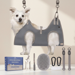 Pet grooming hammock kit with small white dog and accessories on warm neutral background
